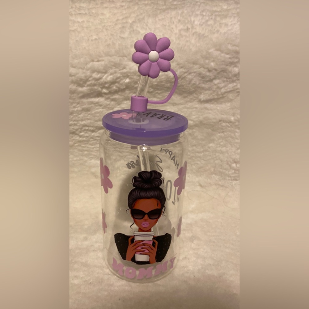Glass cup with a straw